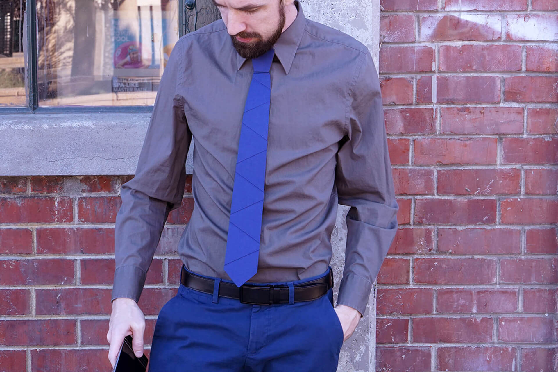 A lifestyle shot showing off a blue cardboard tie.