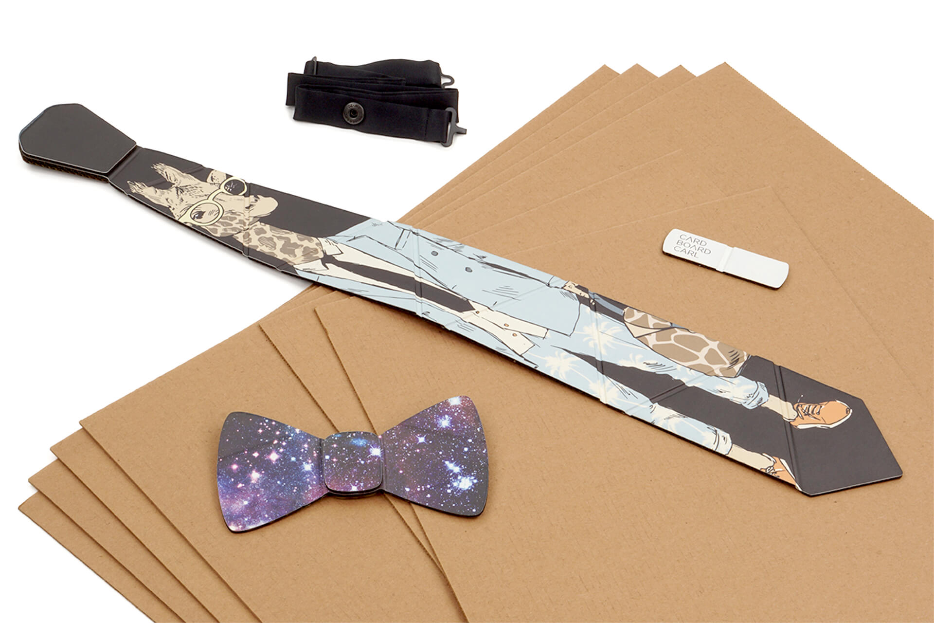 A cardboard neck tie and bow tie resting on cardboard sheets.