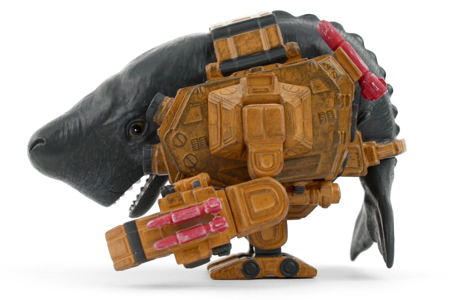 A whale mech toy, shot from the side.